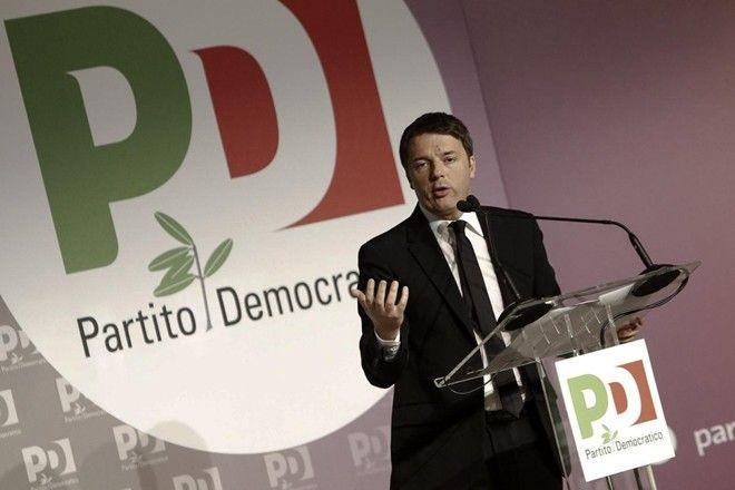 Italian premier Matteo Renzi delivers a speech during the national meeting of the Democratic Party in Rome, Italy, Feb. 21, 2016. Renzi has has told his squabbling democrats that the government might consider resorting to a confidence vote to hasten approval of the law that will allow civil unions, but not marriage, for gay couples. (Giuseppe Lami/ANSA via AP)